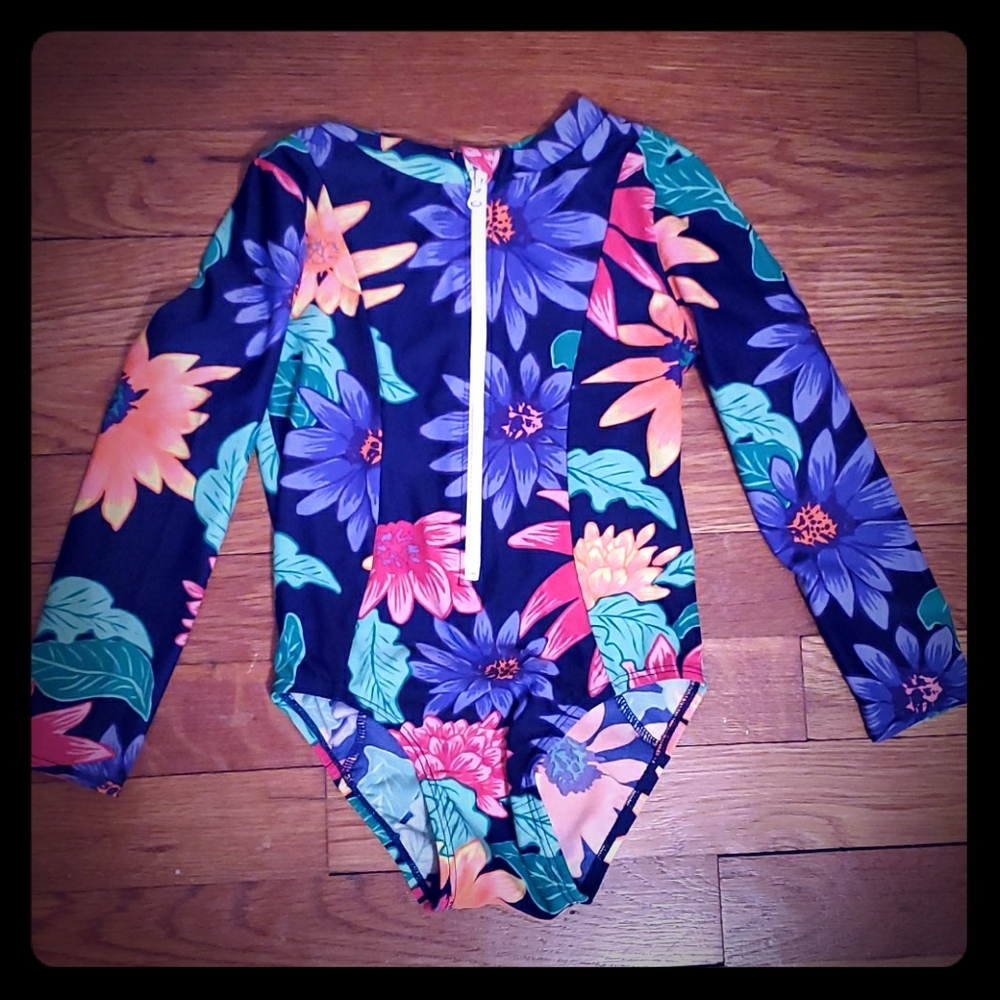 EUC Girls one piece long sleeve rashguard suit